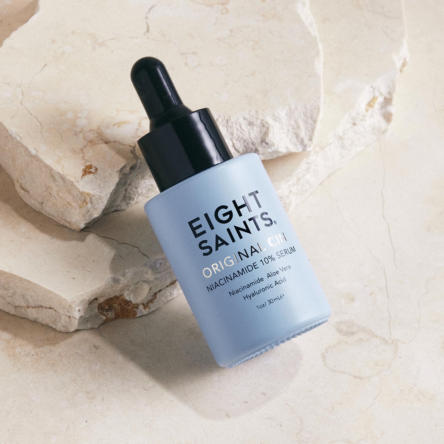 Eight Saints niacinamide serum dropper ready for precise application