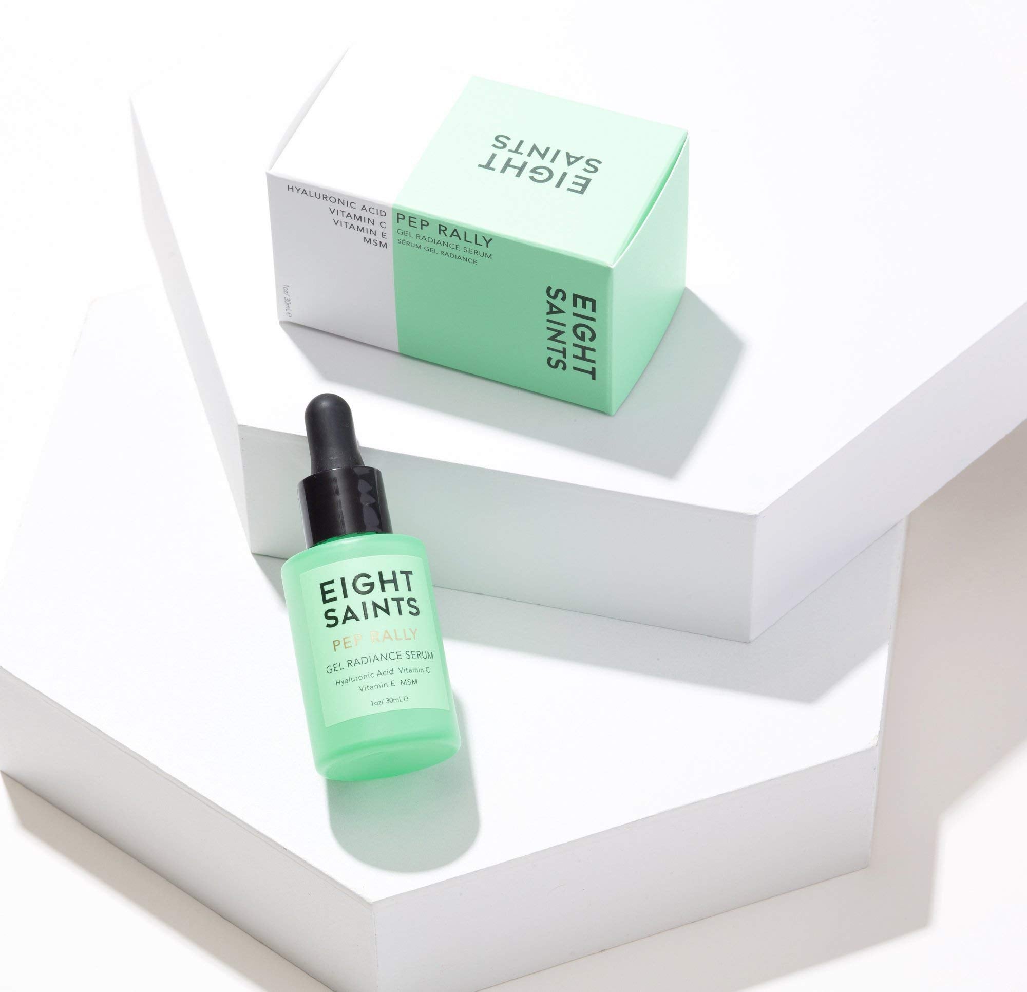 Eight Saints serum dispensing bottle close-up showing quick absorption