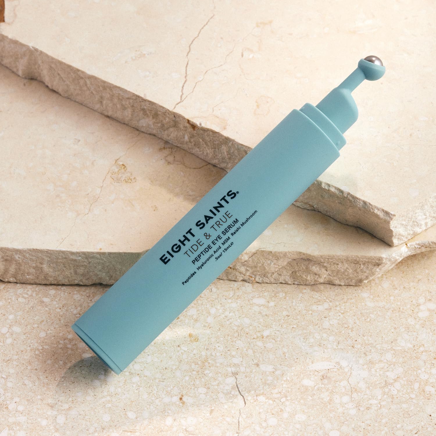 Eight Saints Tide & True Eye Serum roller applicator in use.