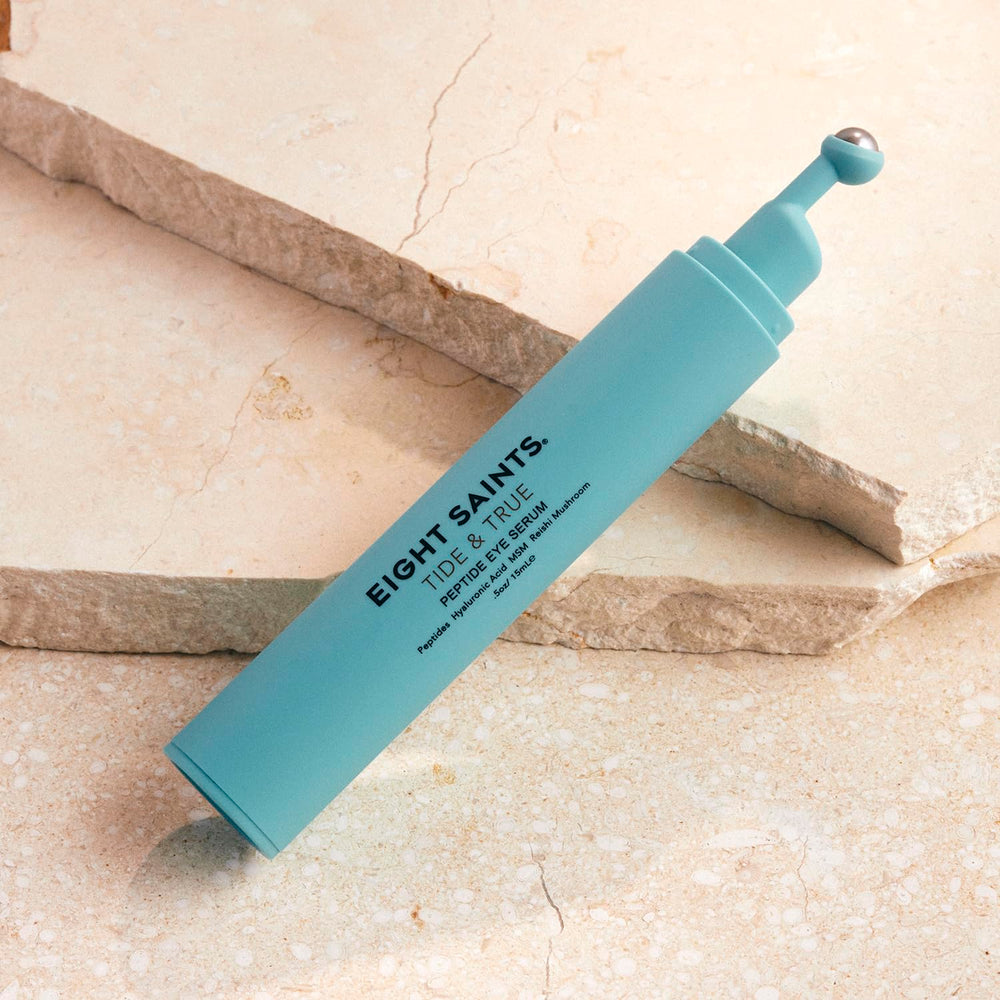 Eight Saints Tide & True Eye Serum roller applicator in use.