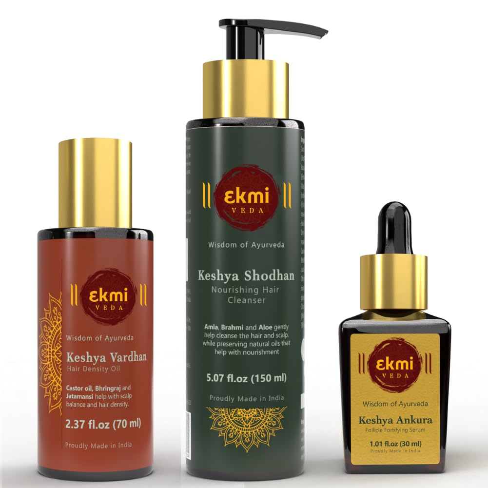 EKMIVEDA hair growth oil bottle with Ayurvedic blend for scalp nourishment