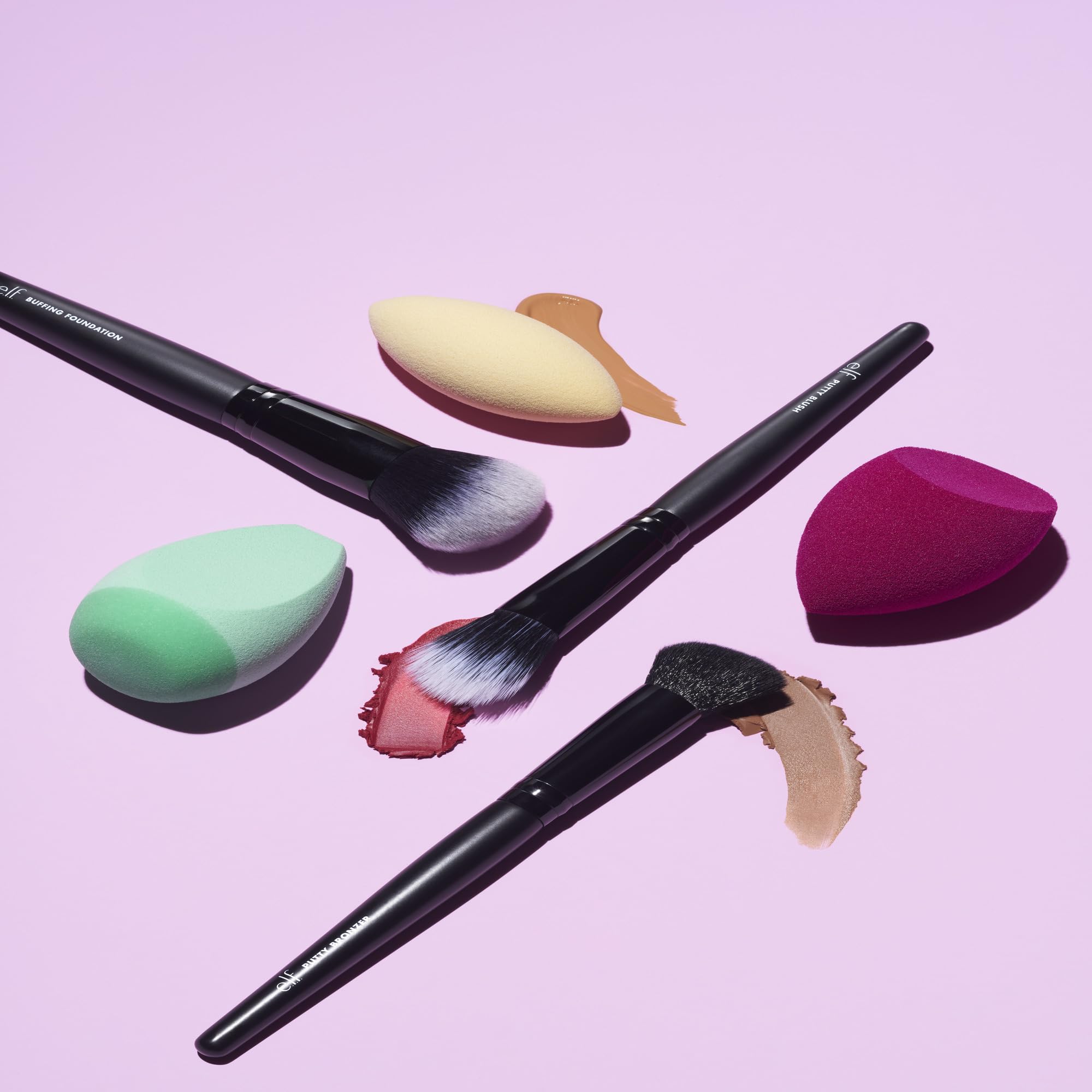 elf buffing foundation brush dome-shaped head blends across cheeks for natural look.