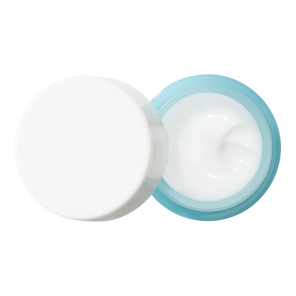 Elf eye cream mini tube during application for quick, non-greasy absorption.