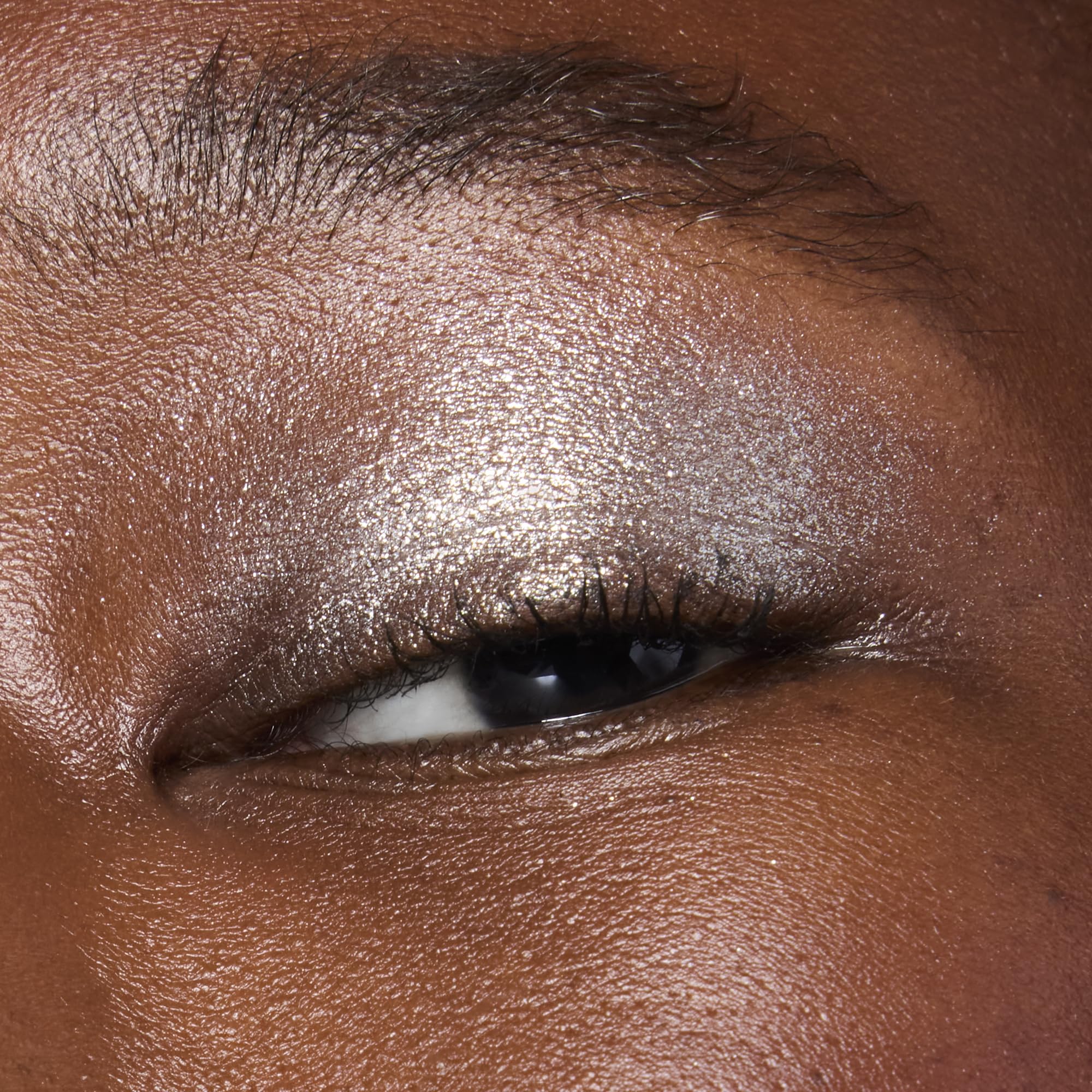 Layered look with e.l.f. Fine as Fleck Glitter Eyeshadow adds dimension.