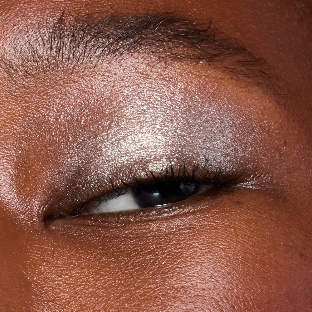Layered look with e.l.f. Fine as Fleck Glitter Eyeshadow adds dimension.