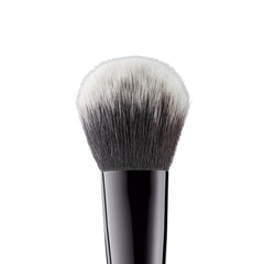 e.l.f. Flawless Face Brush ergonomic grip supports controlled makeup application.