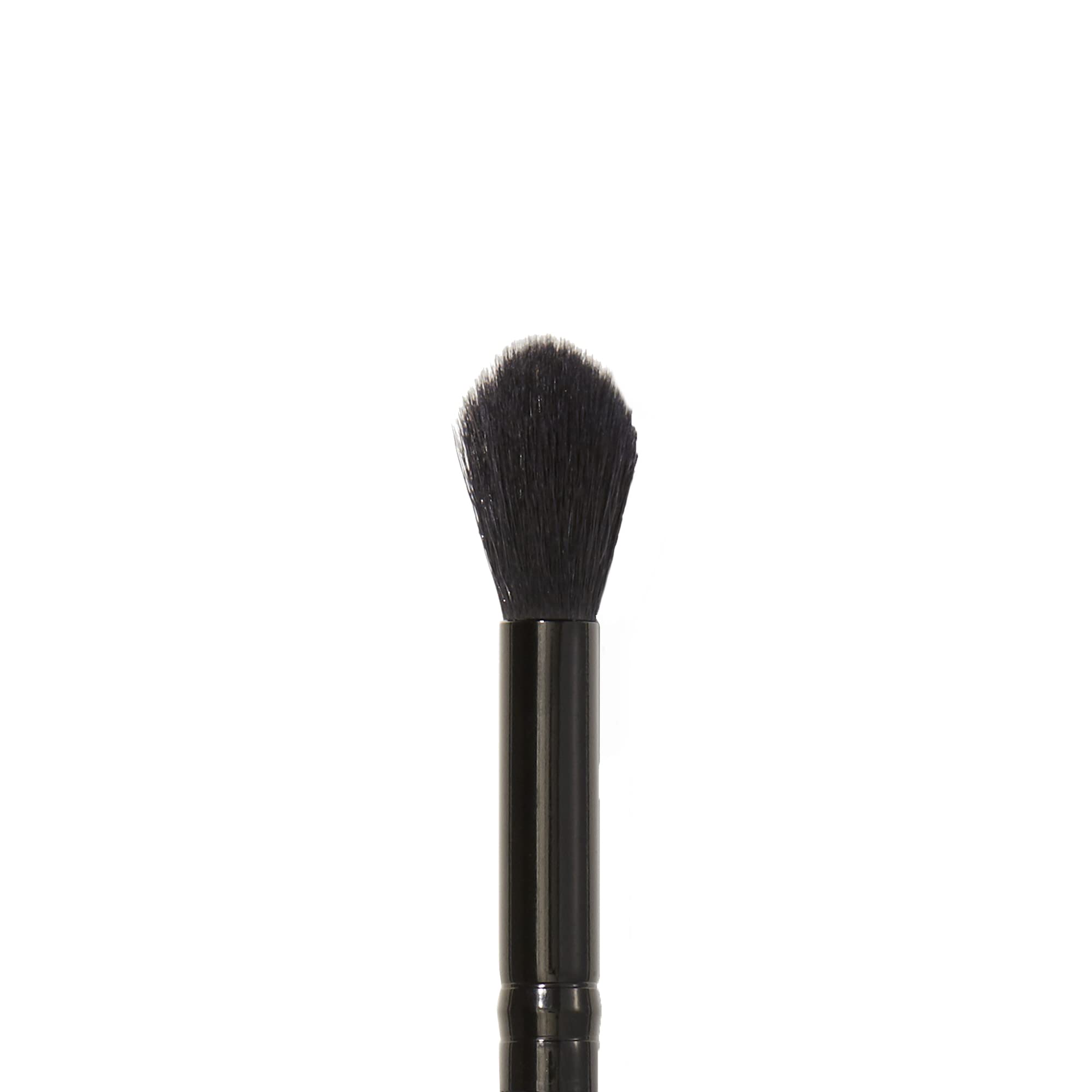 e.l.f. Fluffy Eye Blender Brush sets concealer with powder for a precise finish.