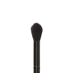 e.l.f. Fluffy Eye Blender Brush sets concealer with powder for a precise finish.
