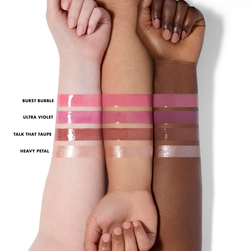 Swatch Heavy Petal en labios para rosa vibrante.
