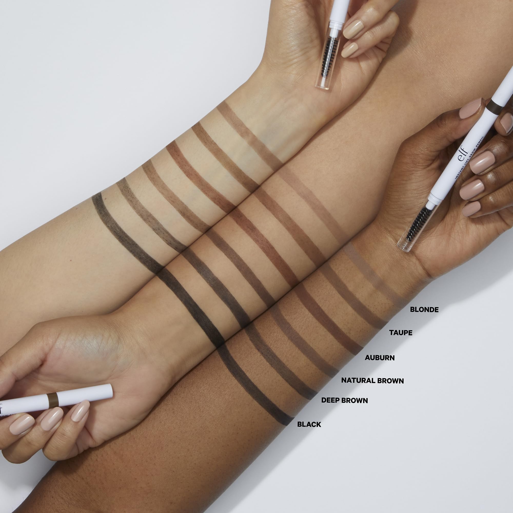 e.l.f. spoolie brush grooming brow hairs into shape for a polished look