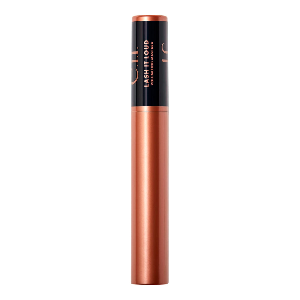 Applying Lash It Loud mascara for bold, defined lashes.