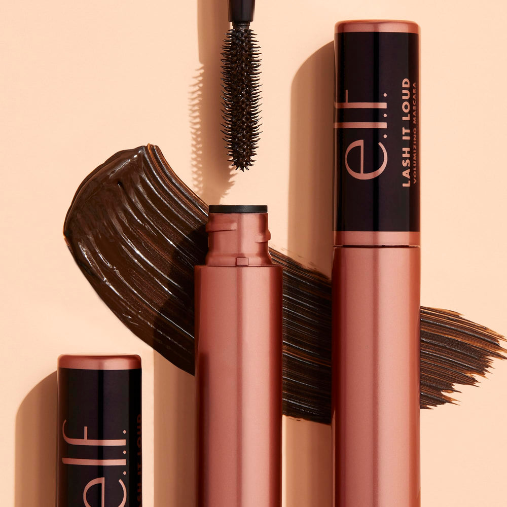 Detail of the Lash It Loud brush with vertical and horizontal bristles.