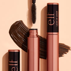 Detail of the Lash It Loud brush with vertical and horizontal bristles.