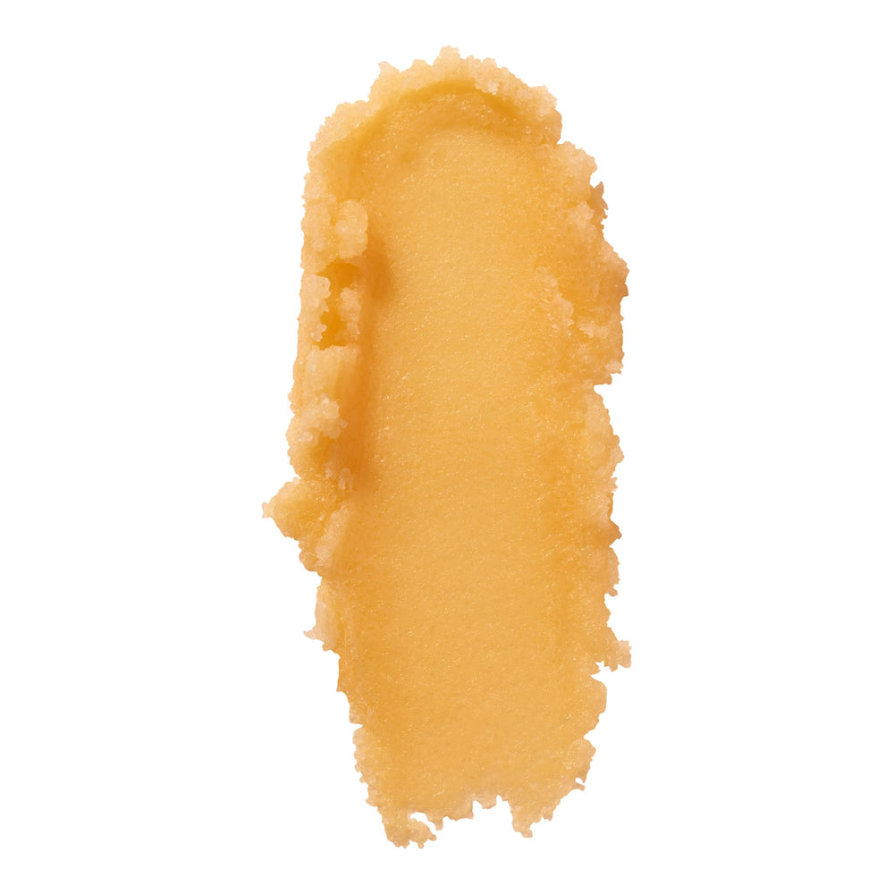 Elf lip exfoliator texture closeup shows gentle sugar grains for smoother lips.