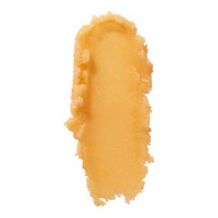 Elf lip exfoliator texture closeup shows gentle sugar grains for smoother lips.