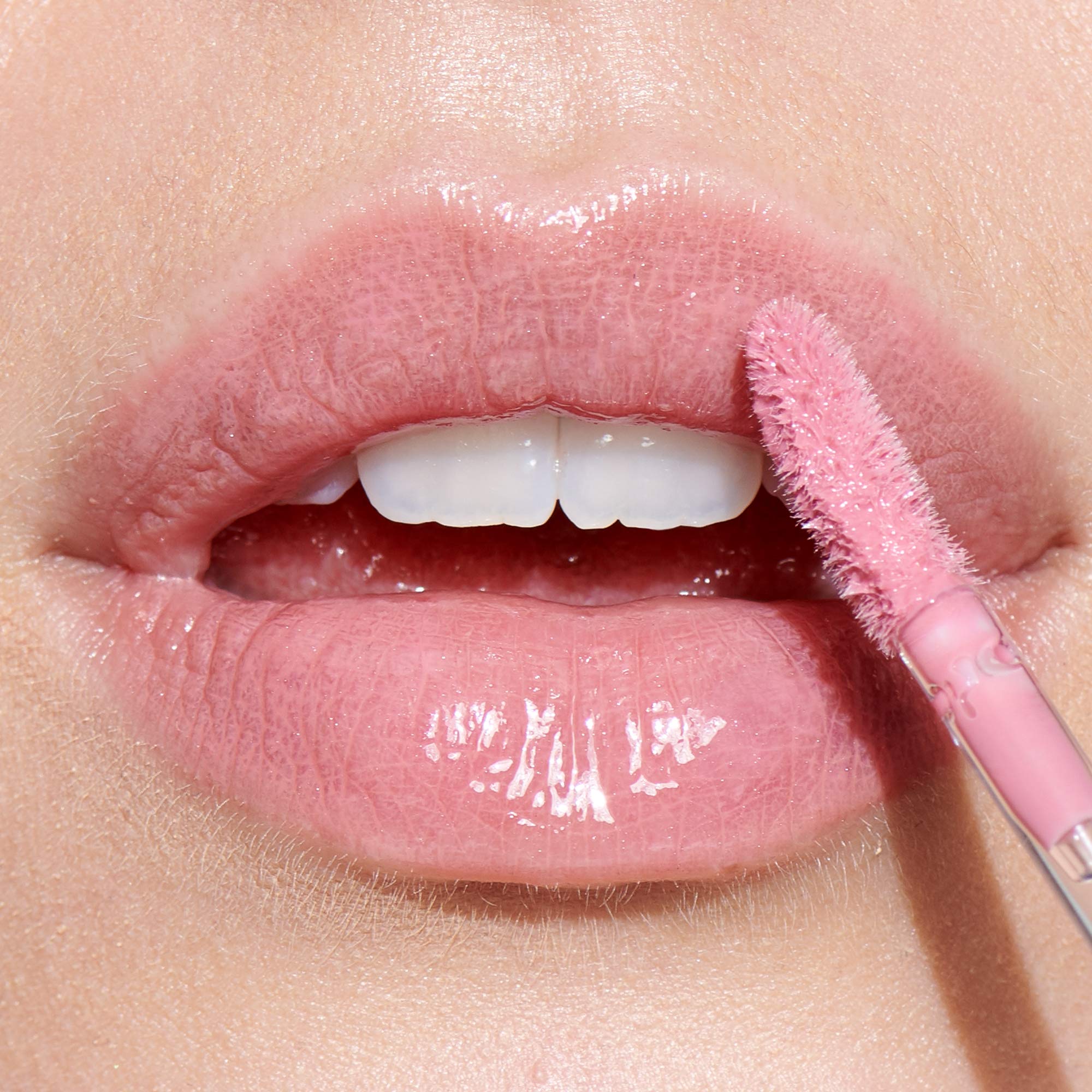 e.l.f. Lip Plumping Gloss compact is travel-friendly and stylish.