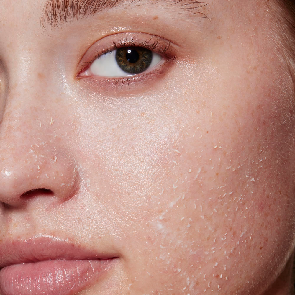 e.l.f. SKIN Gentle Peeling Exfoliant application close-up shows easy circular massage.