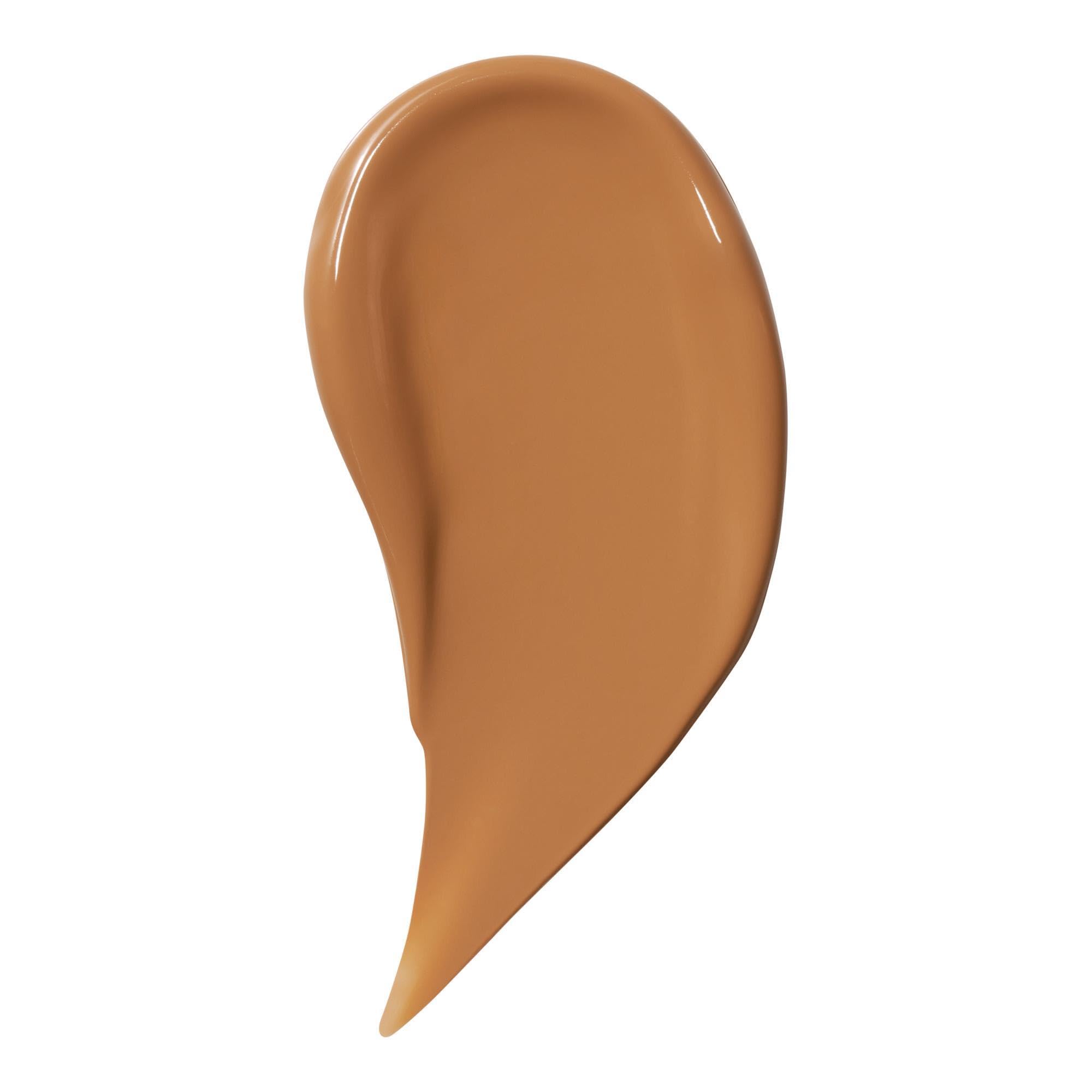 close-up of application process with the wand blending seamlessly on skin