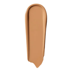 Close-up of bottle showing creamy texture for buildable coverage.