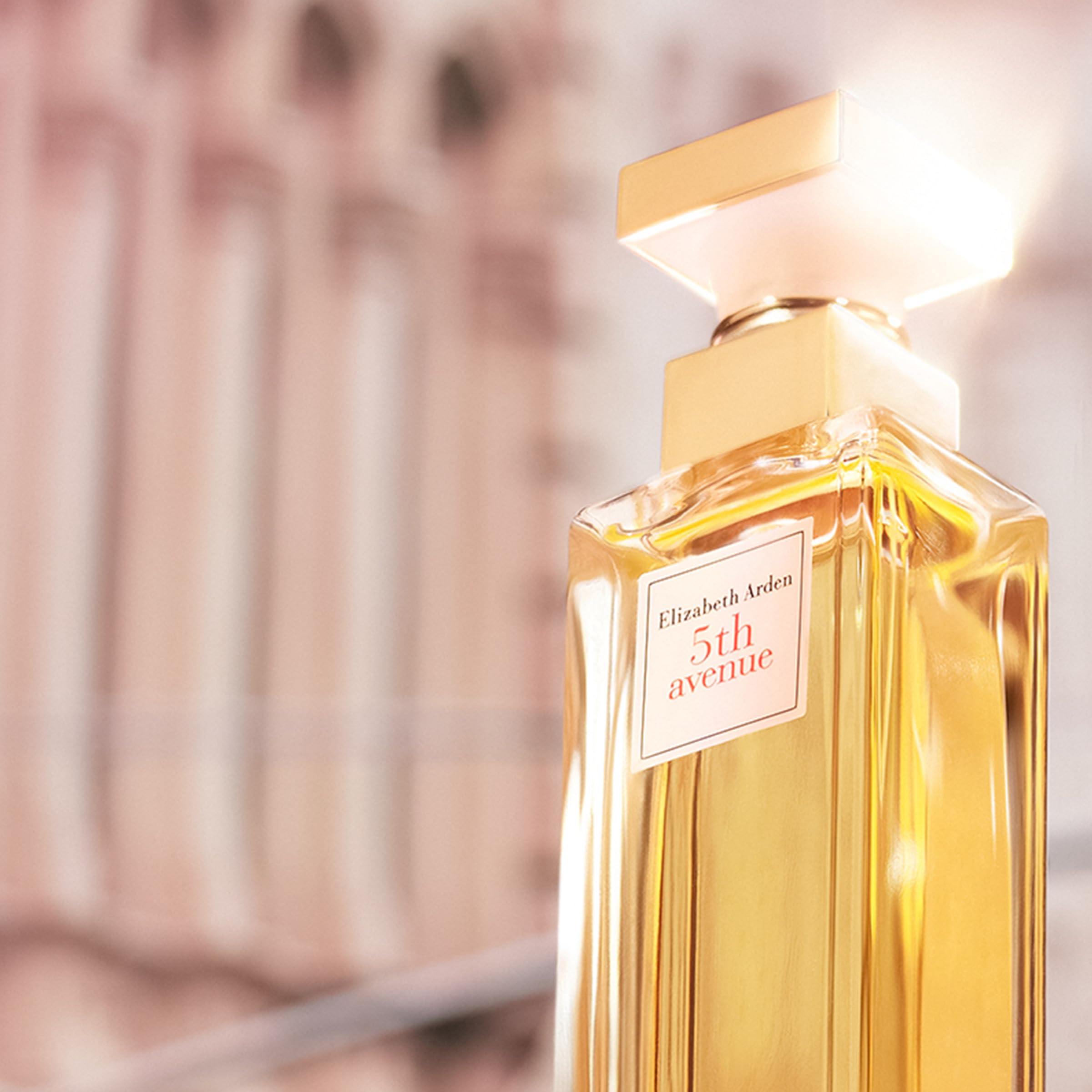 Elizabeth Arden 5th Avenue cap closeup highlights premium packaging