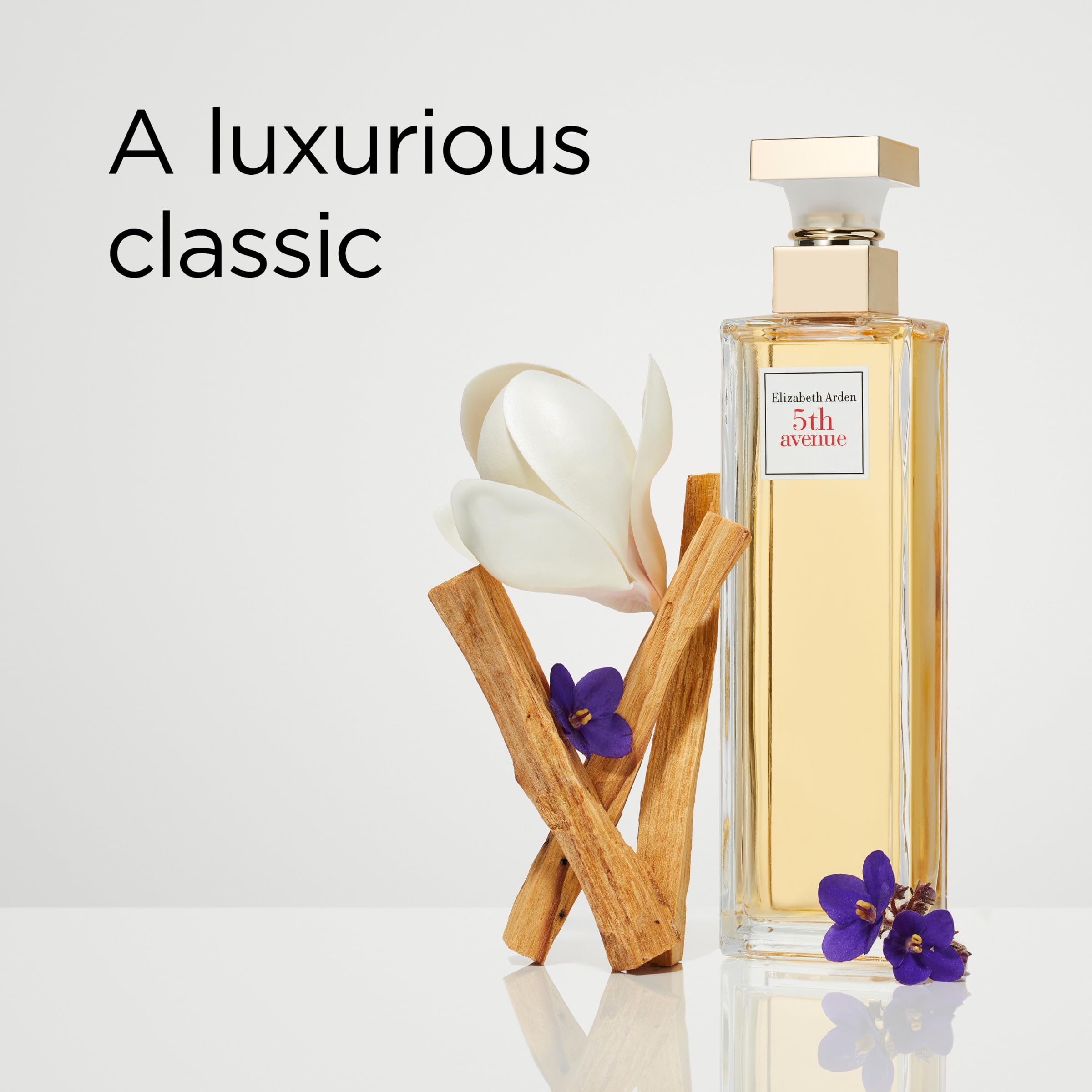 Elizabeth Arden 5th Avenue perfume drops on glass highlight brightness