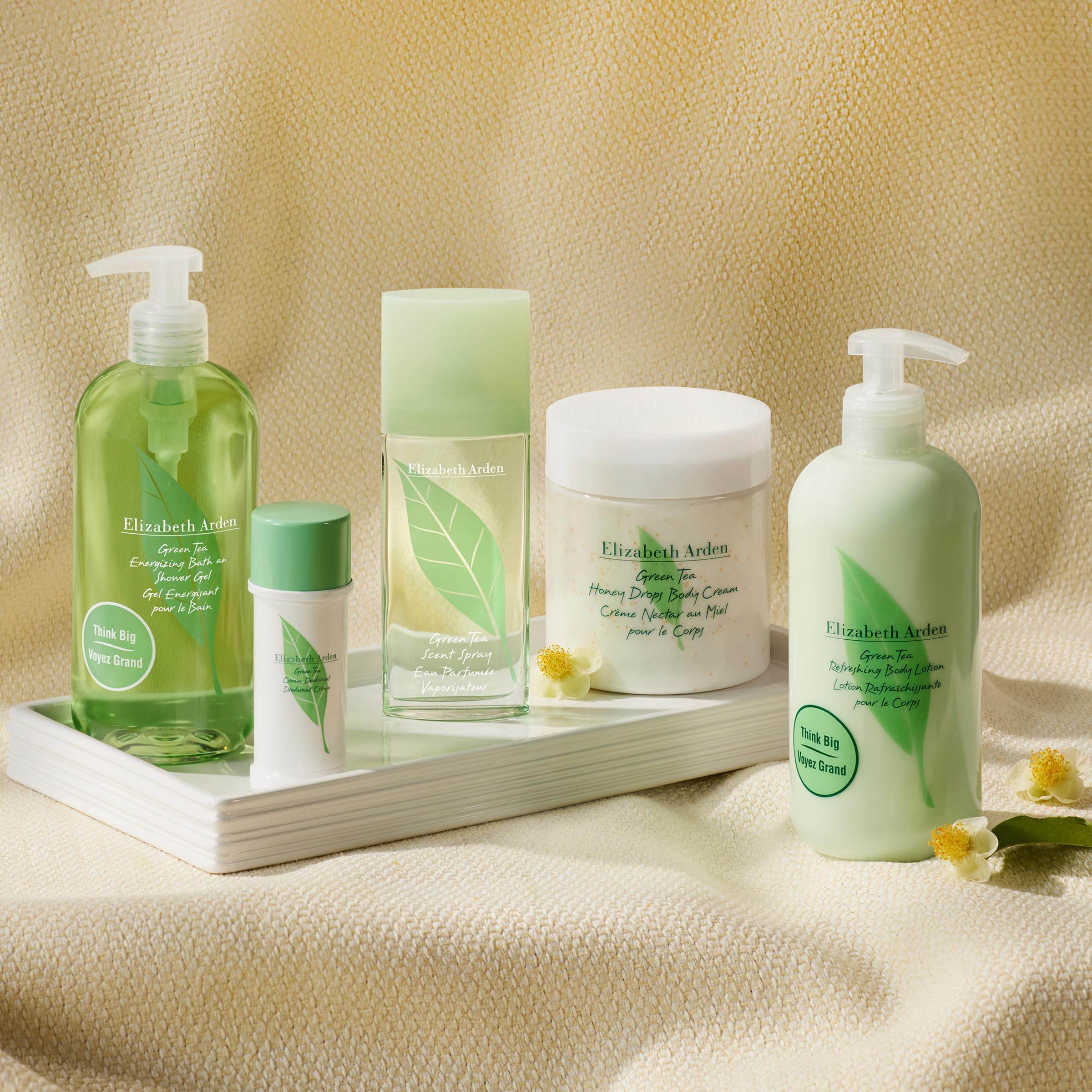 Elizabeth Arden Green Tea Honey Drops Body Cream bottle demonstrates 24-hour hydration.