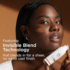 Close-up swatch of Deep Tint on skin demonstrating sheer blend without white cast.