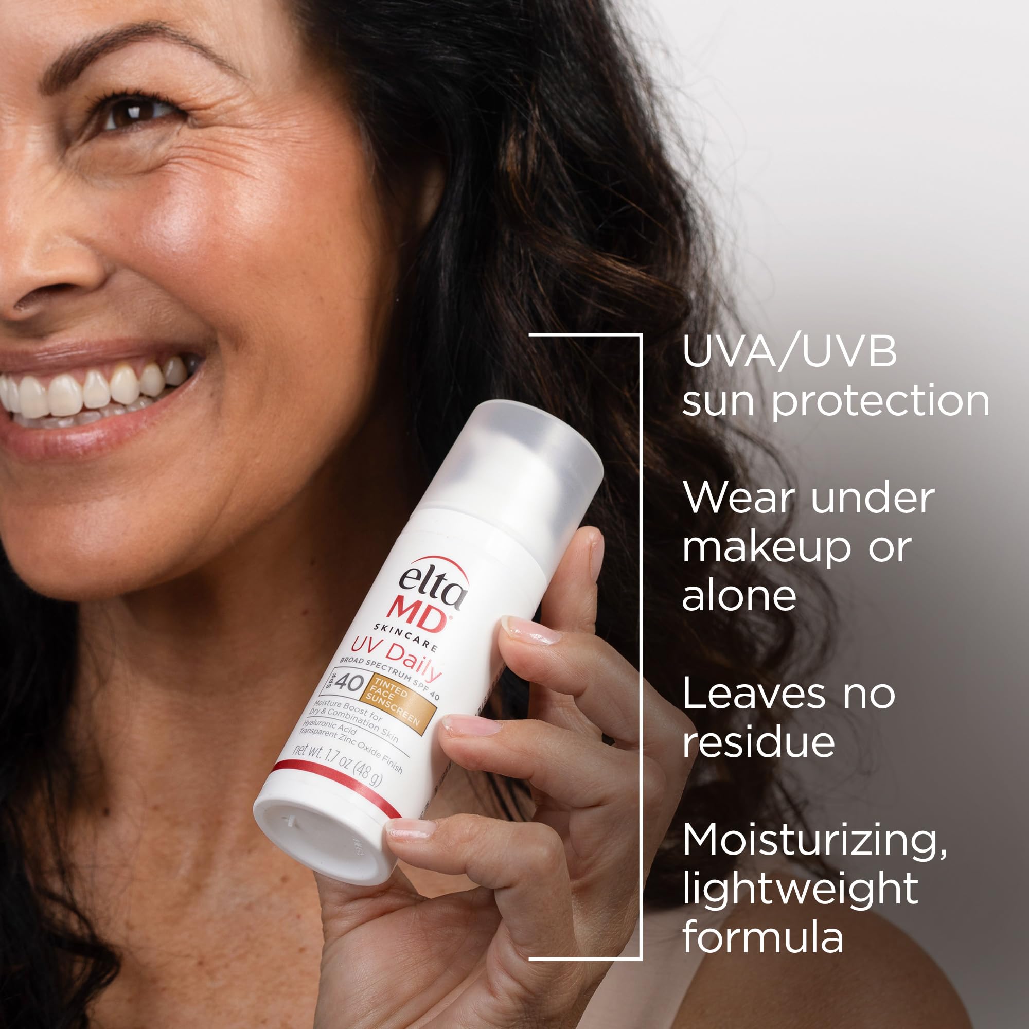Tinted swatch on skin demonstrates natural blending without white cast.