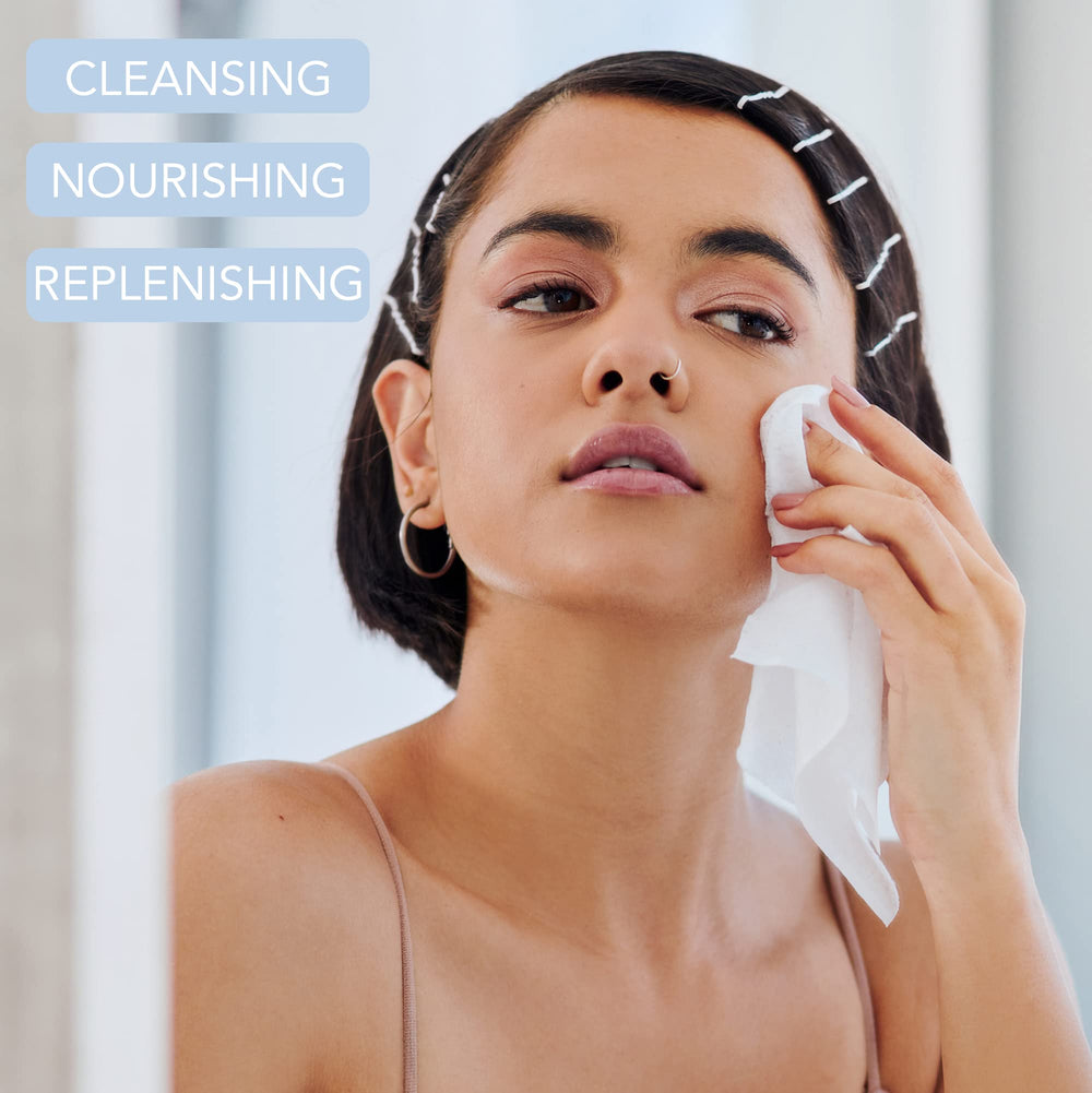 Enchante Dr. Wellness wipes in use on the face for quick refresh.