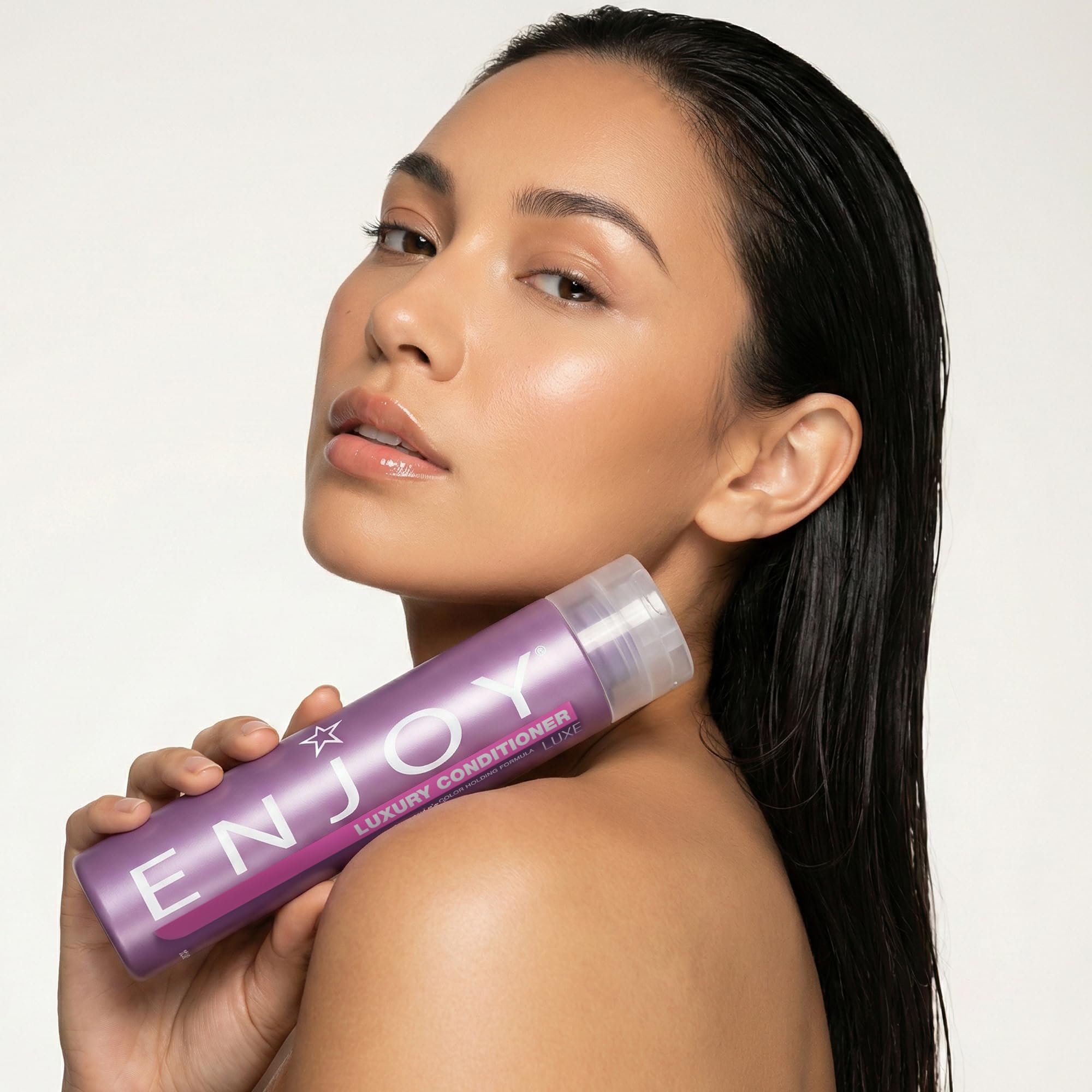 Enjoy Luxury Conditioner daily-use friendly formula for thick or curly hair.