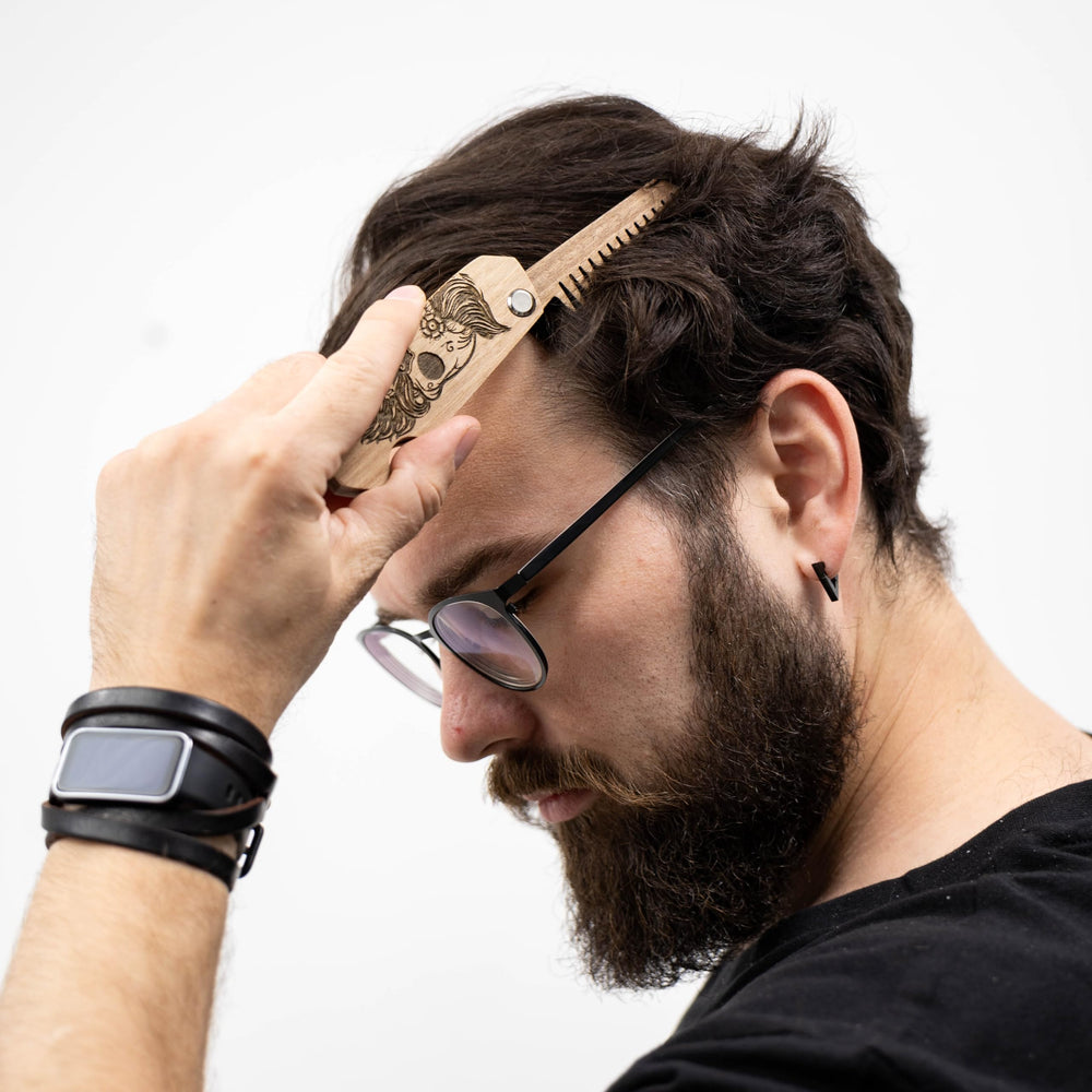 Enjoy The Wood folded beard comb close-up highlighting compact design