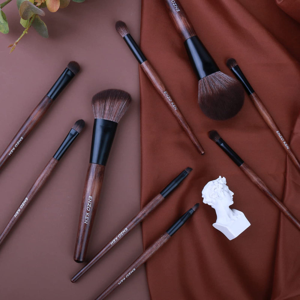 ENZO KEN blush and highlighter brushes for smooth, even finish.