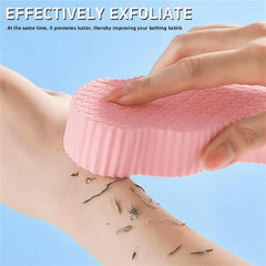 Esponja exfoliante mágica gris, ideal para piel sensible y uso diario.