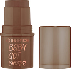 essence Baby Got Bronze stick application on cheekbones for subtle sun-kissed glow.