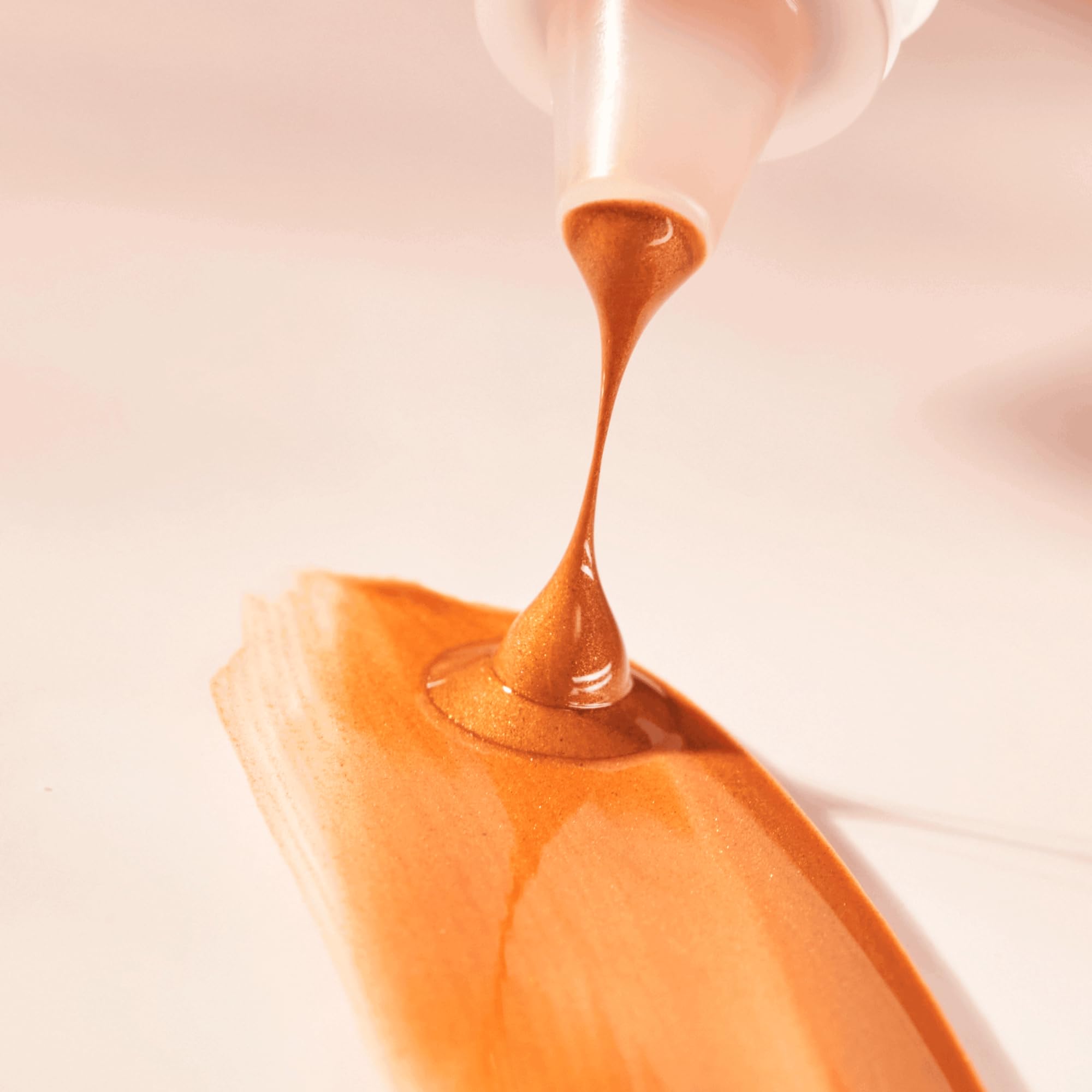essence Drop of Sunshine Bronzing Drops buildable tone on diverse complexions