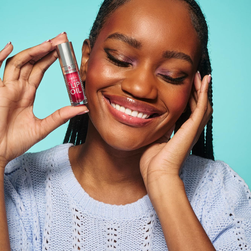 essence Hydra Kiss Lip Oil Pink Champagne shade on lips.