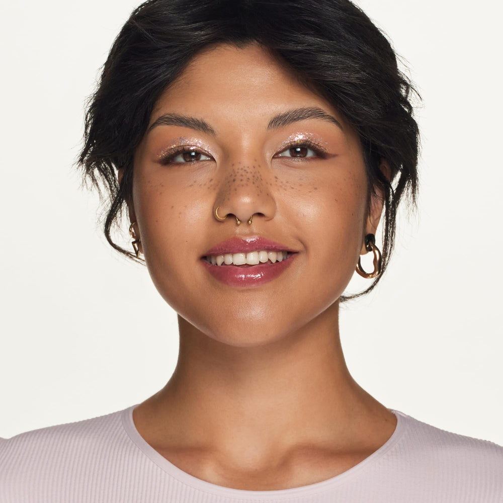 essence Hydra Kiss Lip Oil comes in a travel-friendly tube.