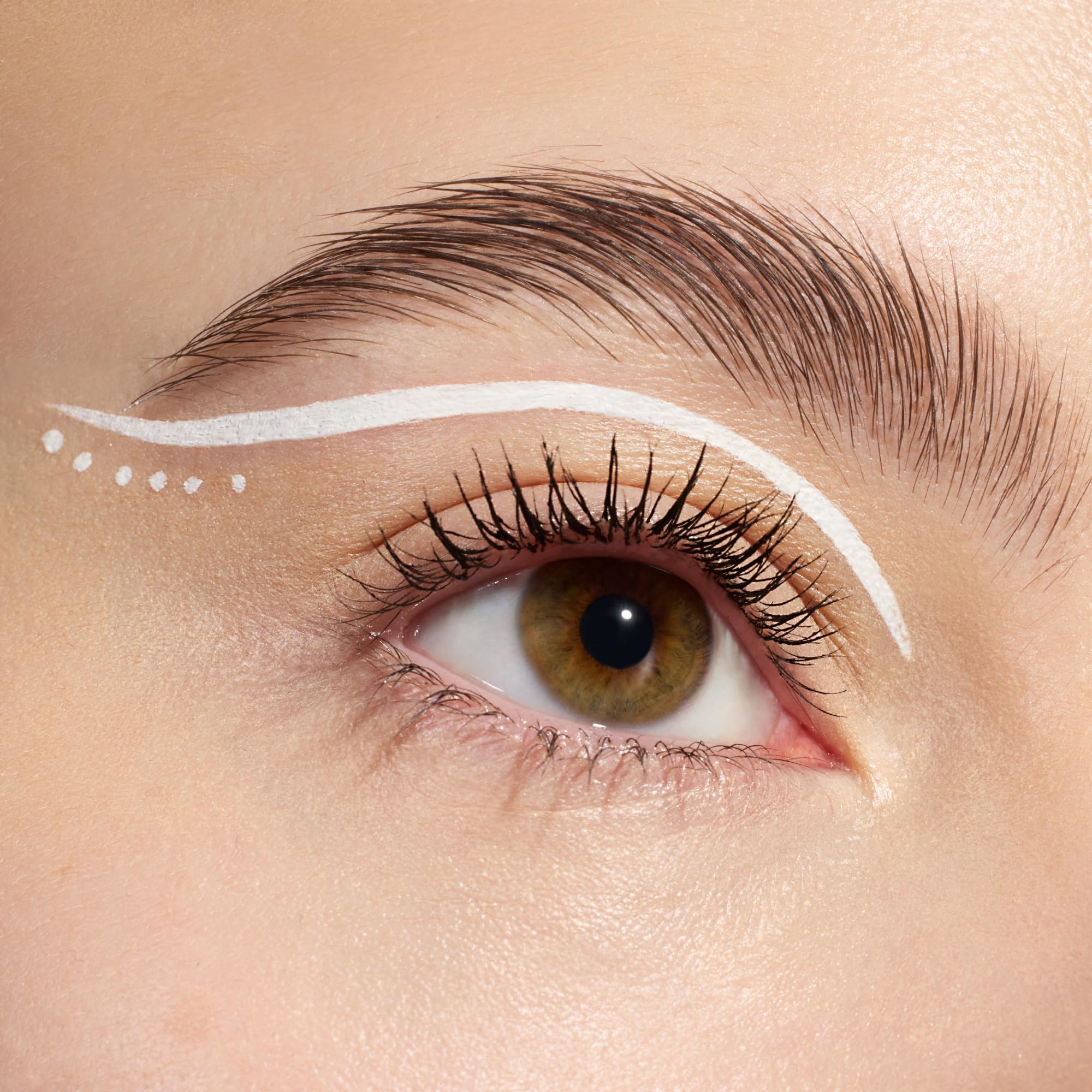 essence Lash Princess Liner White applied to eyelids for contrast and crisp line.