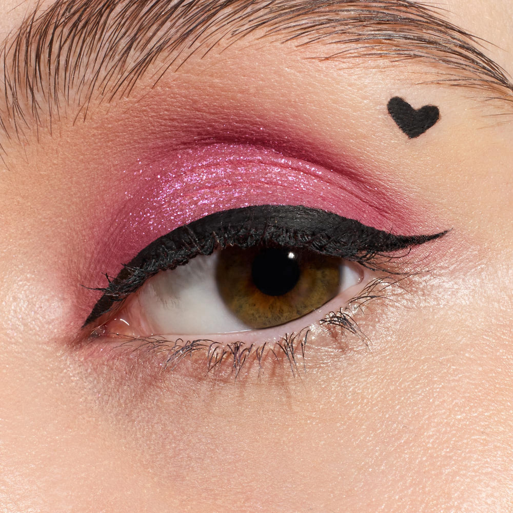 Essence Lash Princess Liquid Liner ultra-fine brush closeup enabling precise lines.