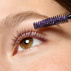 essence Lash Princess Purple lashes fanned for lifted look.