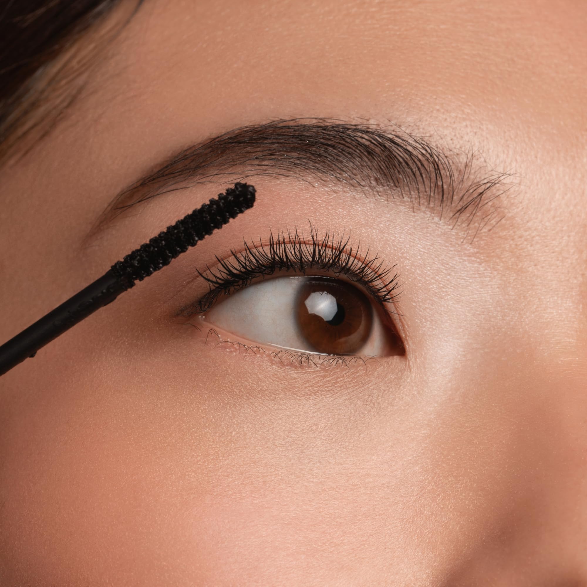 Essence Lash Princess Slim Brush long-curl result with lifted lashes.
