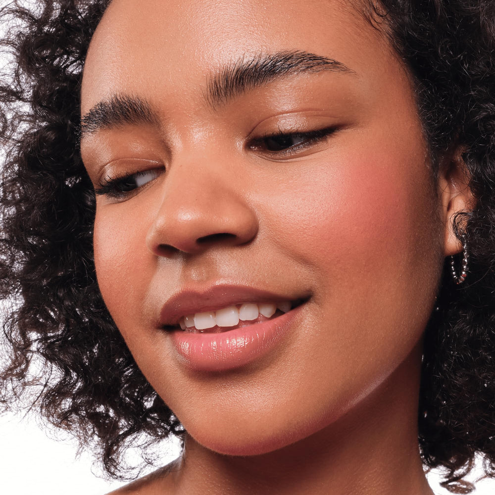 essence swirl blush on the cheek for natural warmth and radiance