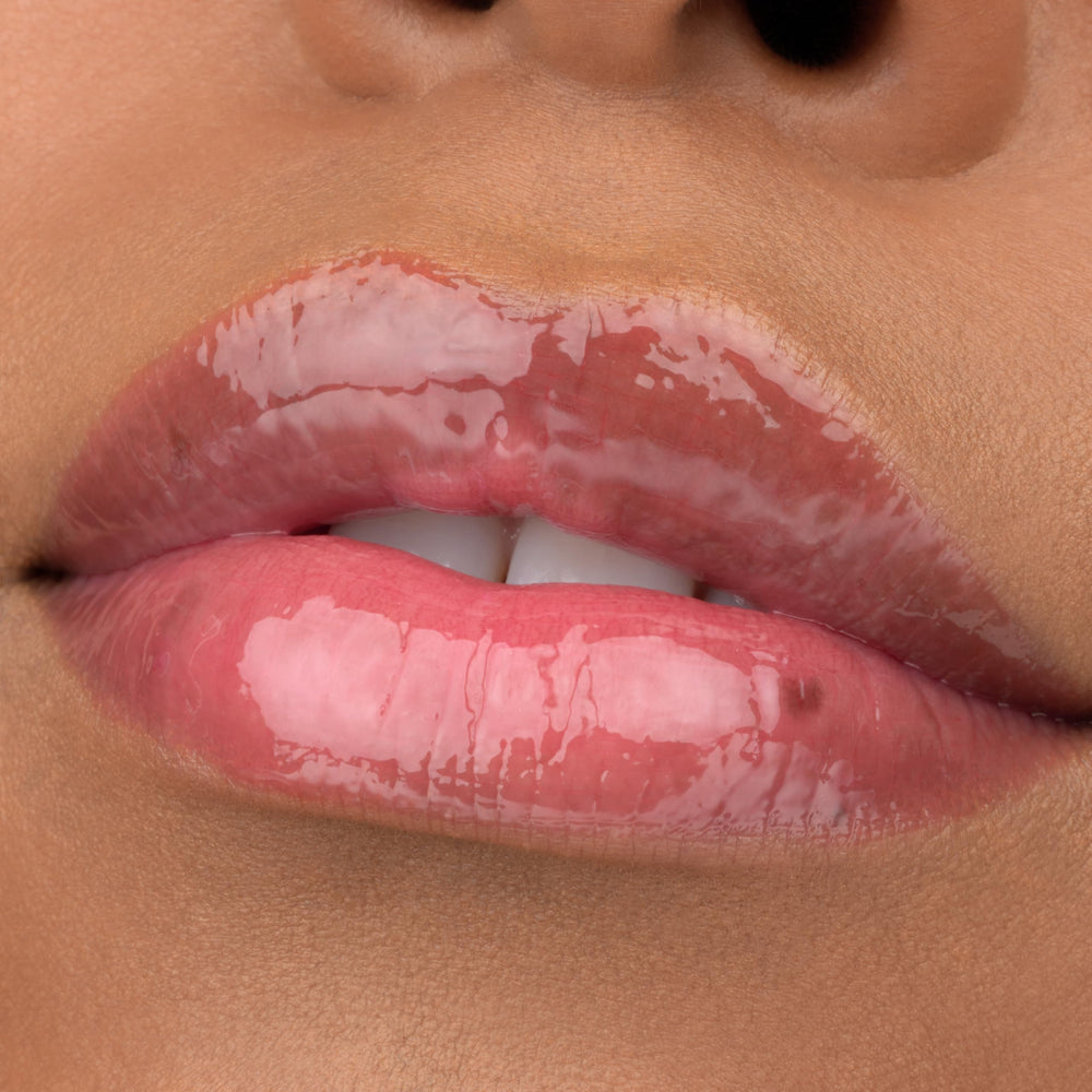 essence What the Fake lip filler gloss sheen—soft moisturized lips with shine.