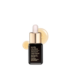Sérum Advanced Night Repair de Estée Lauder en envase mini para viaje, hidratación rápida.