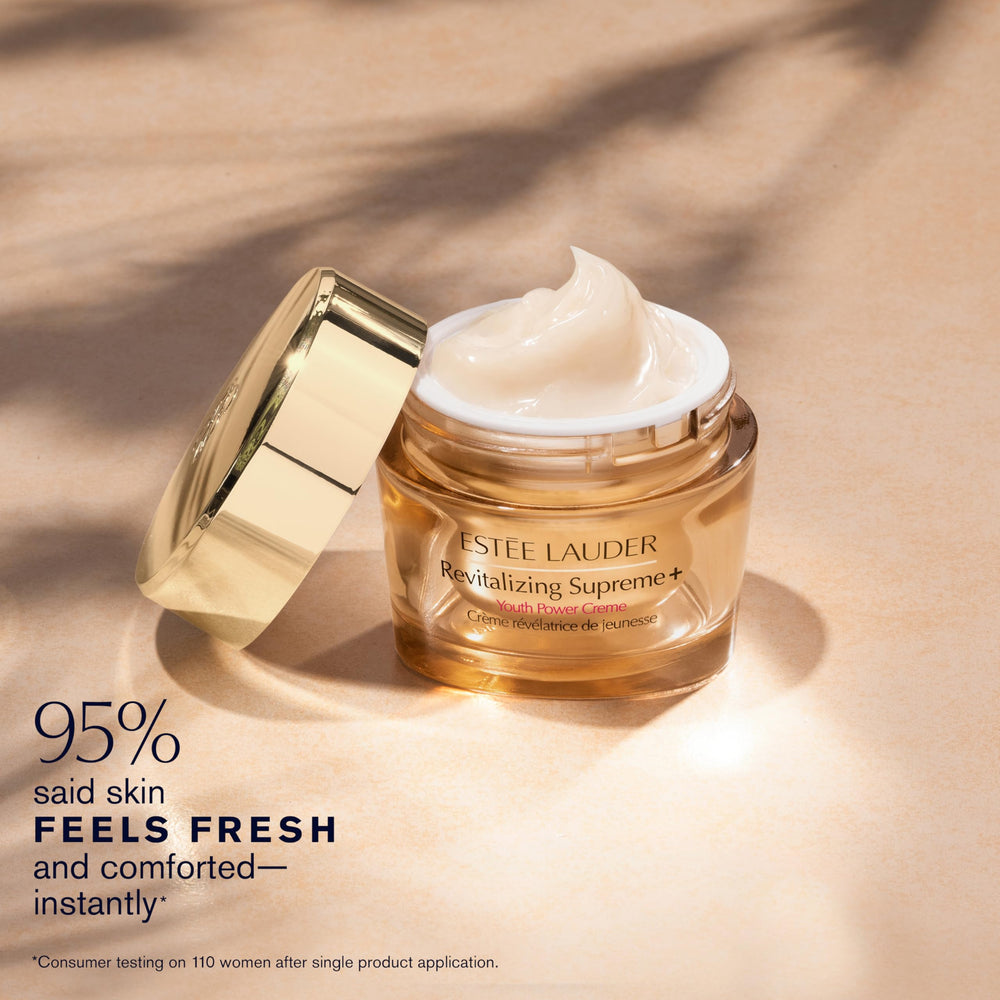Estée Lauder jar open with visible cream demonstrating nourishing moisturizer inside