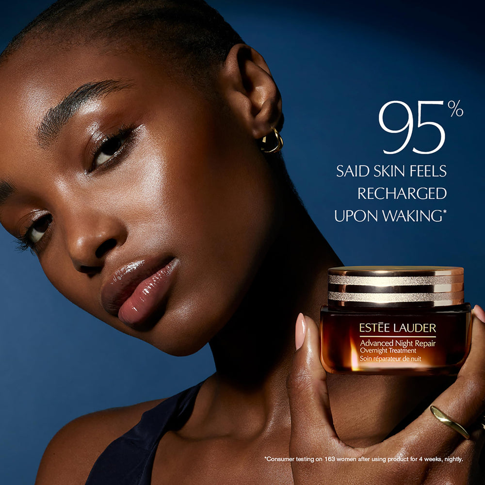 Estée Lauder Advanced Night Repair bottle with glow in background hints at refreshed mornings.