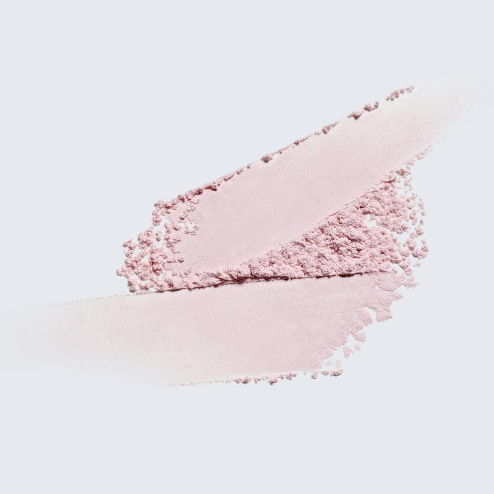 Estée Lauder Beautiful Body Powder tuberose note offers warm sweetness.