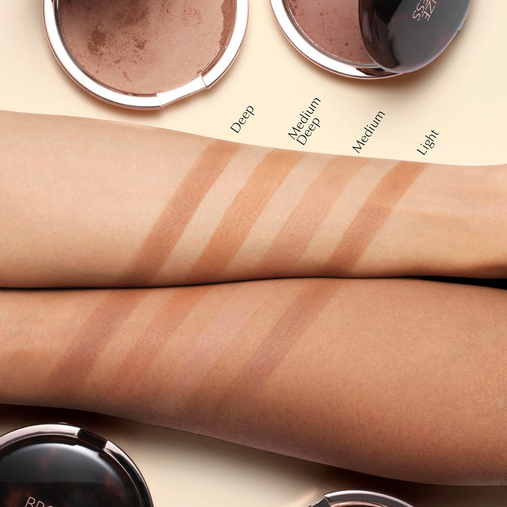Bronzer on decolletage for cohesive sun-kissed glow