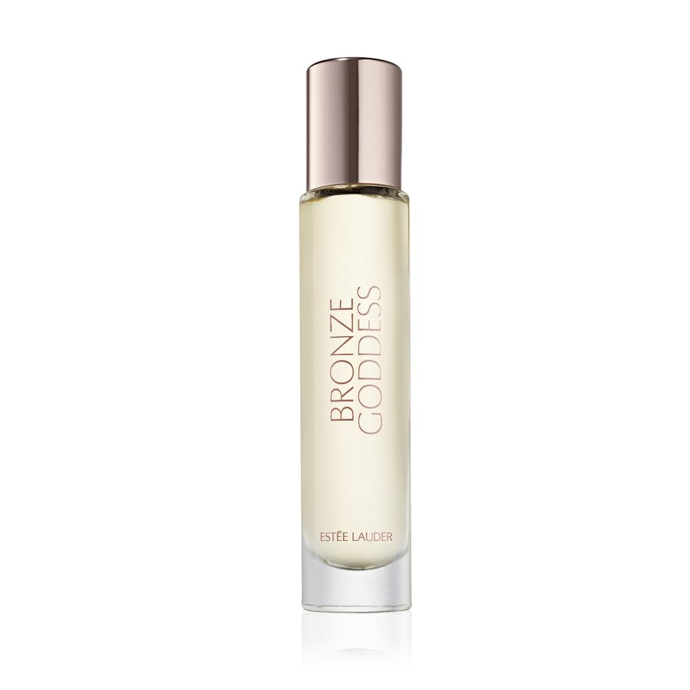 Estee Lauder Bronze Goddess Eau Fraiche bottle glows in warm light, great for daytime radiance.