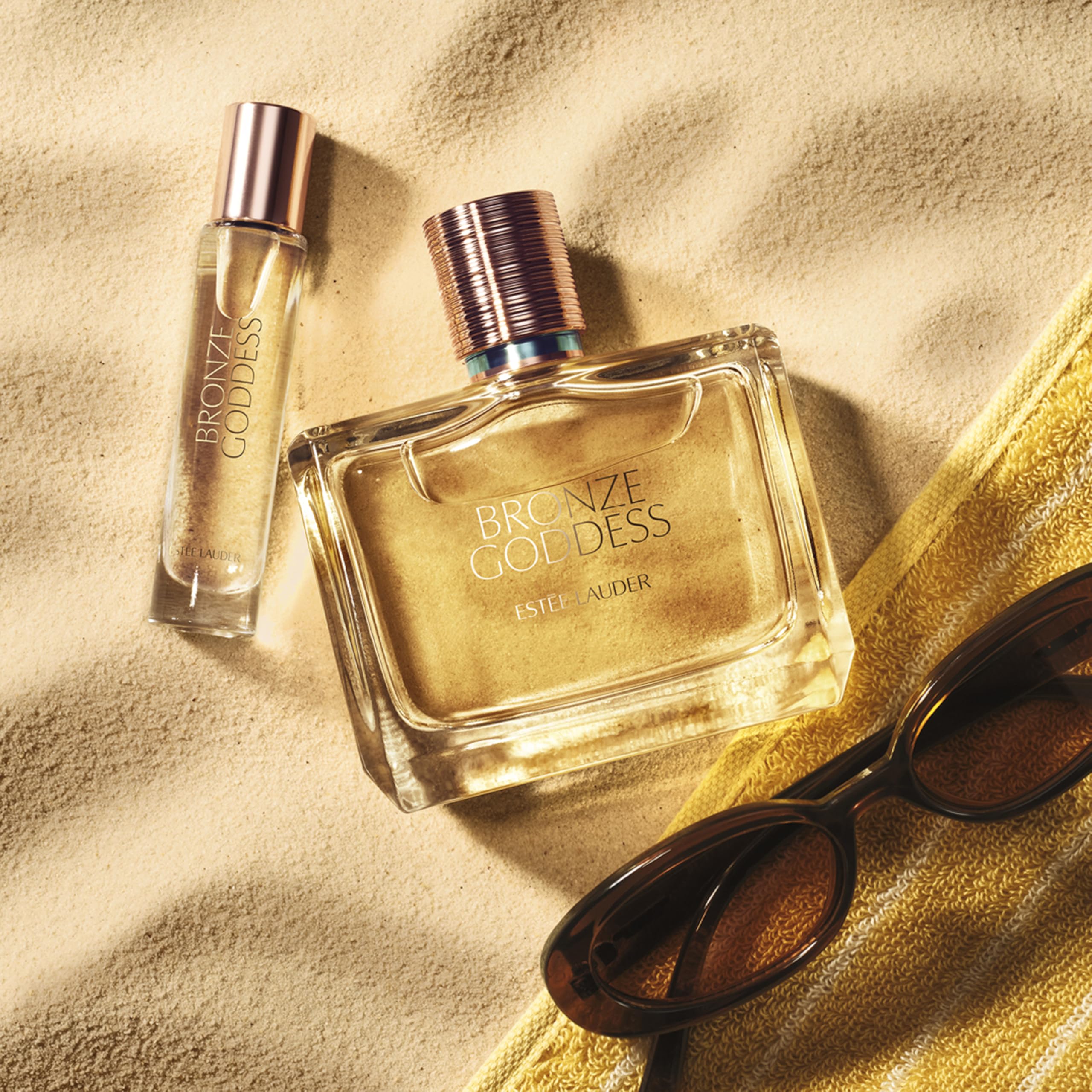 Close-up of creamy coconut notes in Bronze Goddess Eau Fraiche bottle.